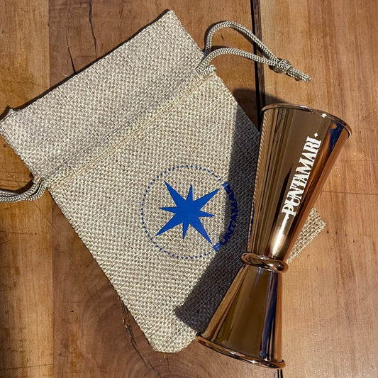 Jigger in rame e astuccio in cotone naturale Puntamari, accessori eco-friendly per un gin sostenibile italiano e artigianale pugliese